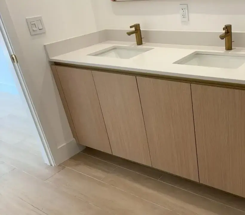 New double vanity installed in an apartment bathroom by Ligio's Solutions in Miami